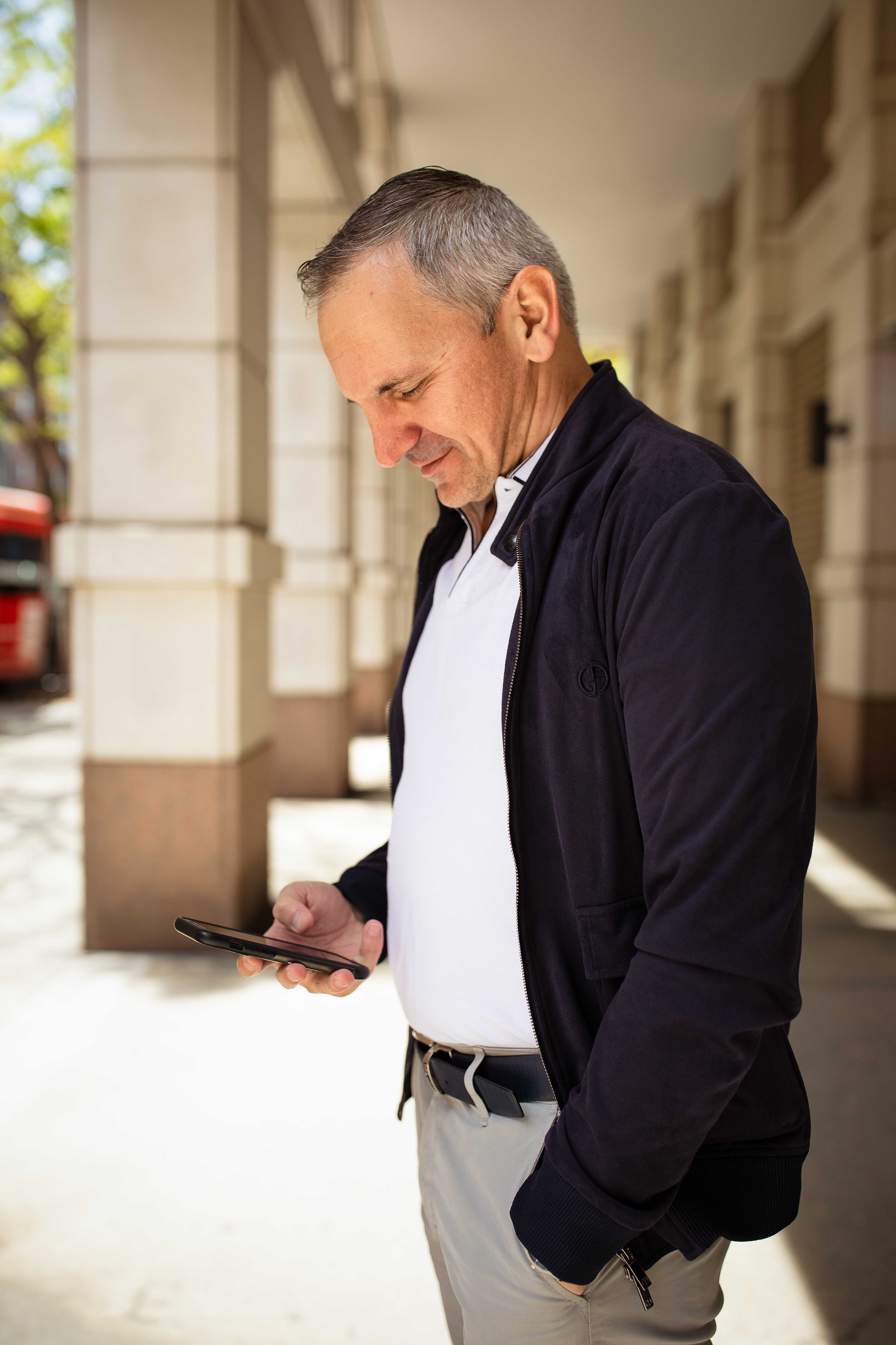 Maksim Grinberg on phone in 2023
